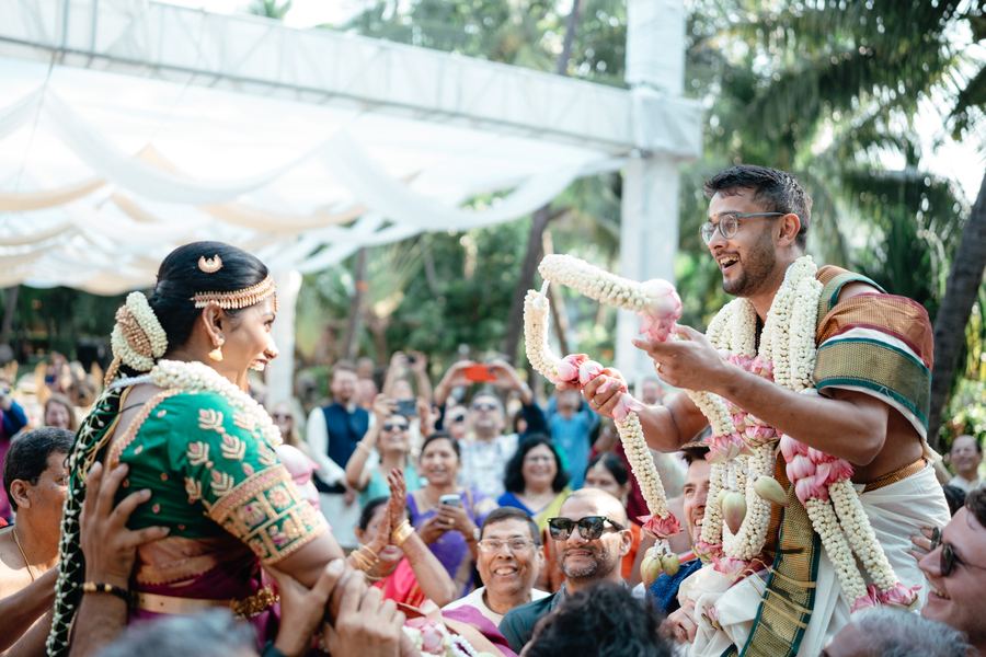 Garlands exchanged above the crowd