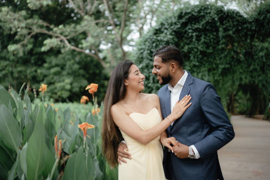 A couple among flowers in a garden